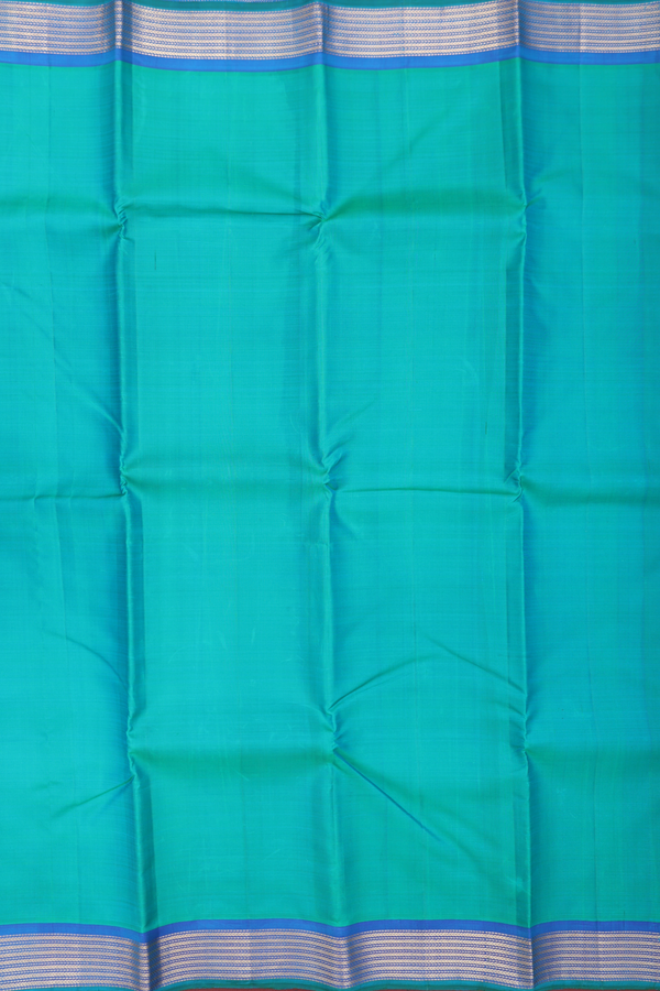 Kanchipuram Silk Saree In Peacock Green With Contrast Border