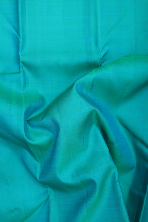Kanchipuram Silk Saree In Peacock Green With Contrast Border