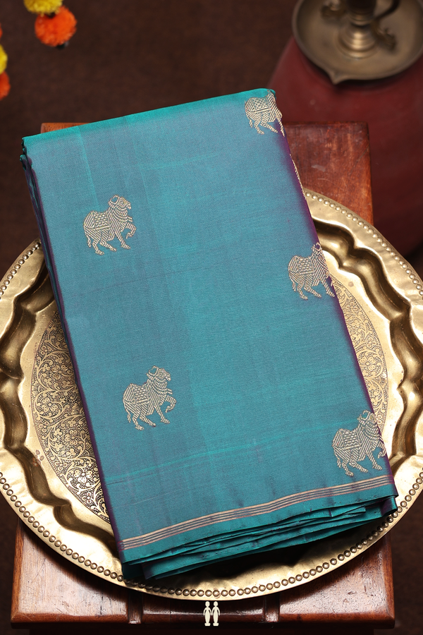 Kanchipuram Silk Saree In Peacock Green With Zari Buttas