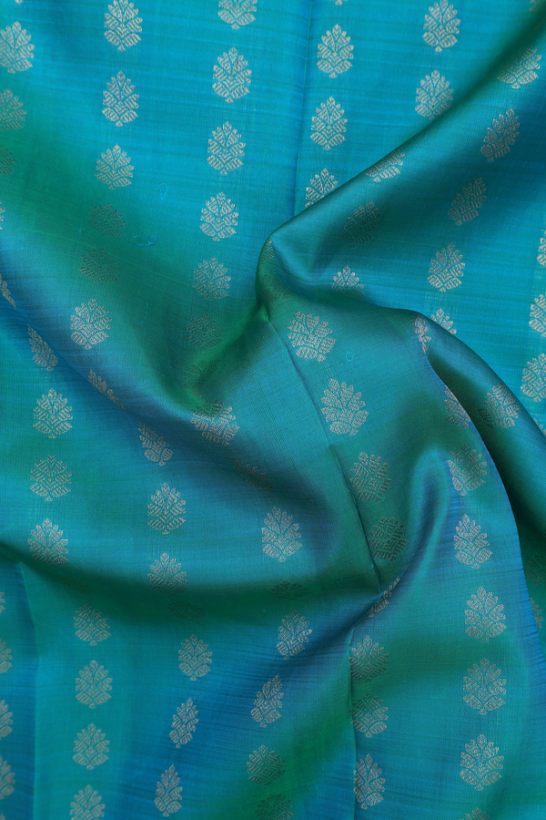 Kanchipuram Silk Saree In Peacock Green With Zari Buttas