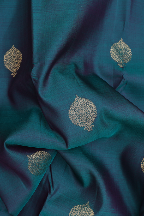 Kanchipuram Silk Saree In Peacock Green With Zari Buttas