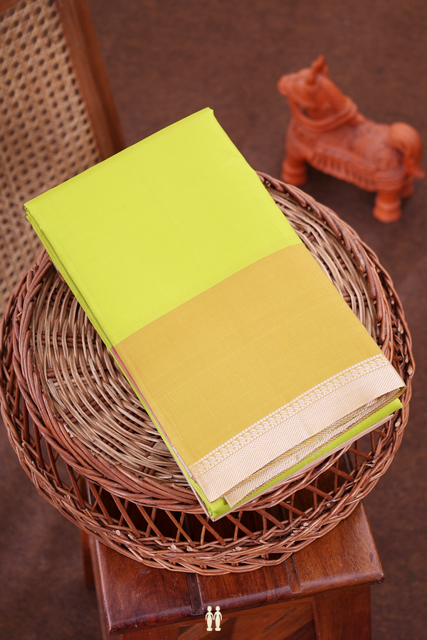 Kanchipuram Silk Saree In Pear Green With Contrast Border