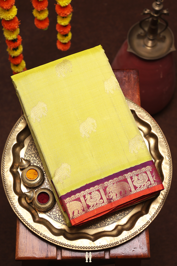 Kanchipuram Silk Saree In Pear Green With Elephant Buttas