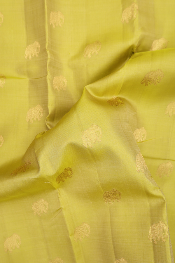 Kanchipuram Silk Saree In Pear Green With Elephant Buttas