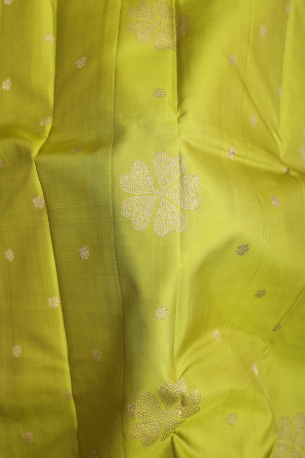 Kanchipuram Silk Saree In Pear Green With Floral Buttas