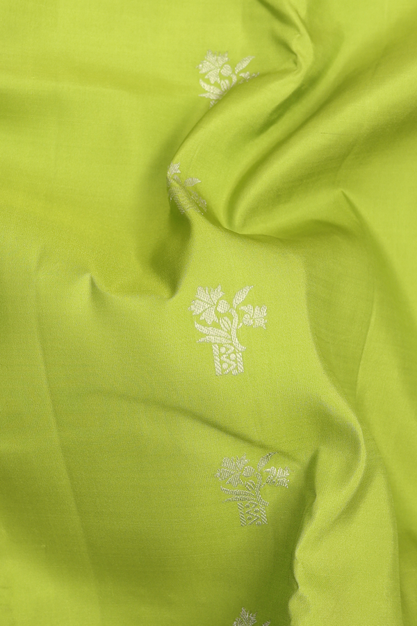 Kanchipuram Silk Saree In Pear Green With Floral Buttas