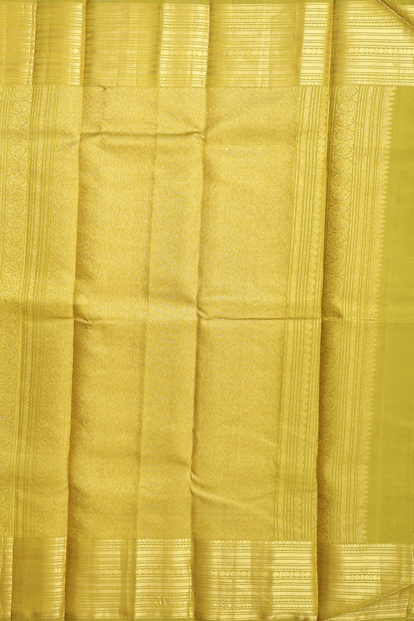 Kanchipuram Silk Saree In Pear Green With Peacock Buttas