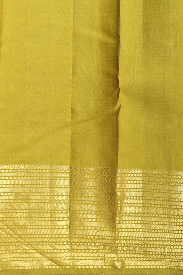 Kanchipuram Silk Saree In Pear Green With Peacock Buttas
