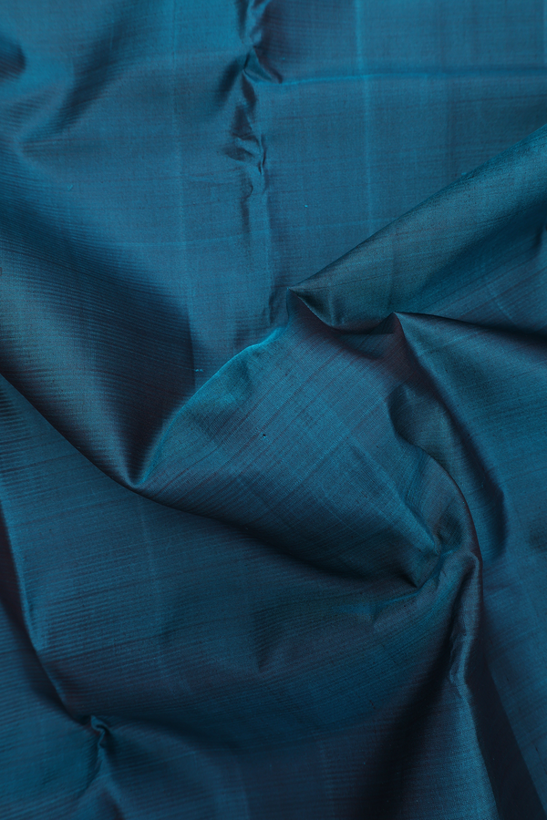 Kanchipuram Silk Saree In Pine Green With Contrast Border