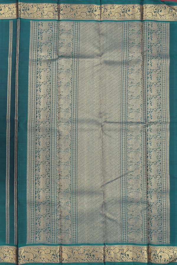 Kanchipuram Silk Saree In Pine Green With Peacock Buttas