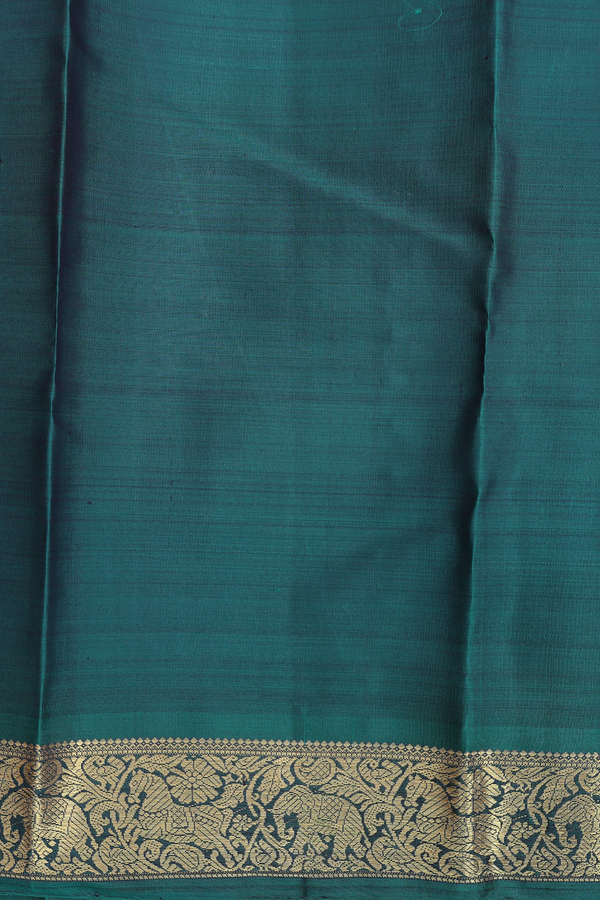 Kanchipuram Silk Saree In Pine Green With Peacock Buttas