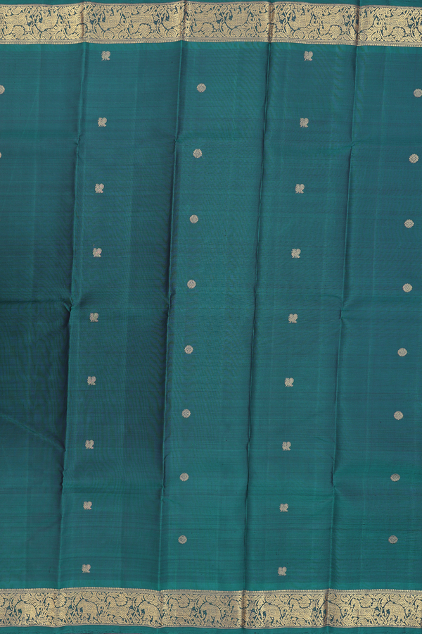 Kanchipuram Silk Saree In Pine Green With Peacock Buttas