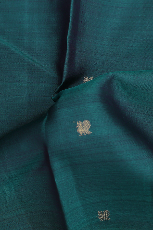 Kanchipuram Silk Saree In Pine Green With Peacock Buttas