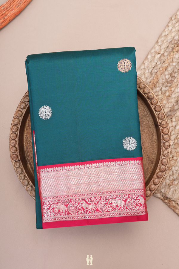 Kanchipuram Silk Saree In Pine Green With Zari Buttas