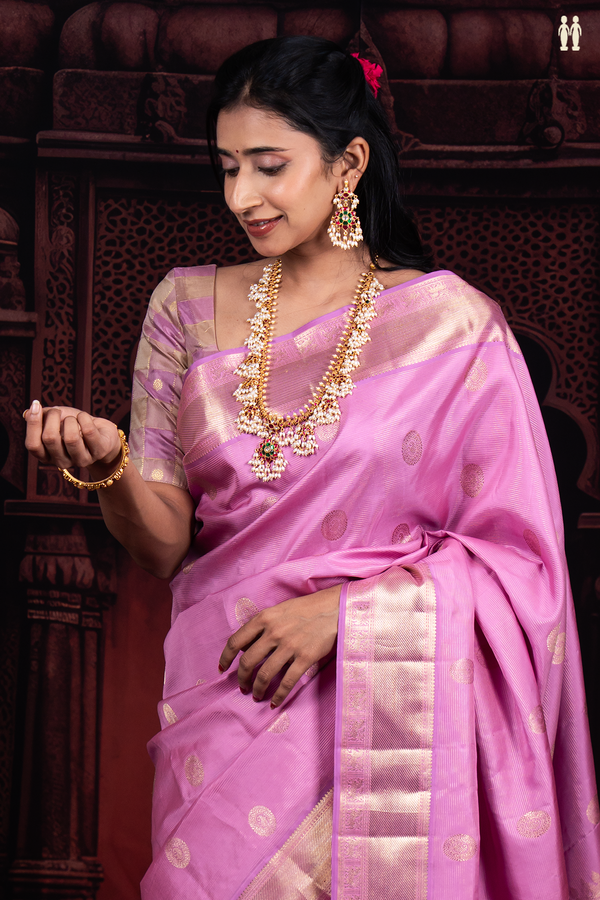 Kanchipuram Silk Saree In Pink Along Stripes With Buttas