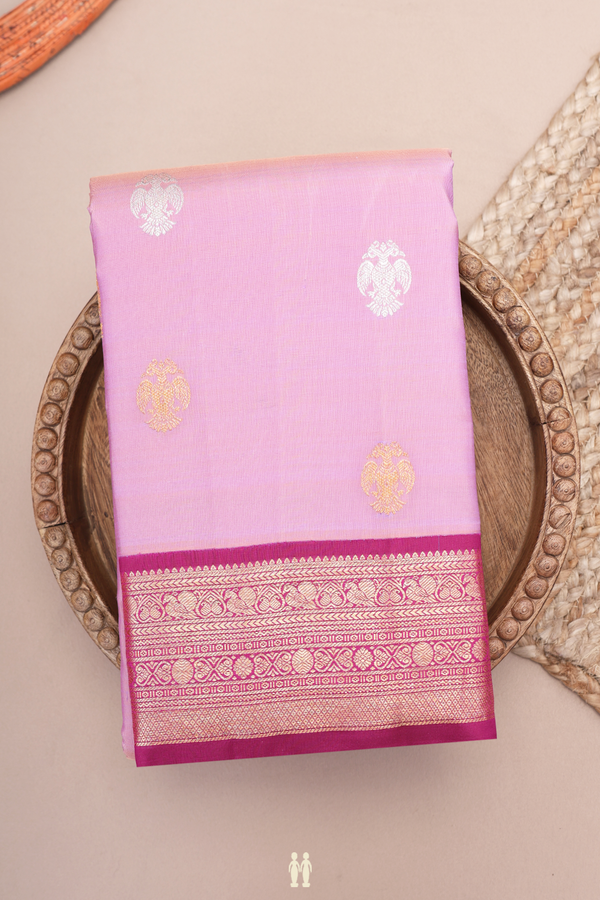 Kanchipuram Silk Saree In Pink With Iruthalai Pakshi Buttas