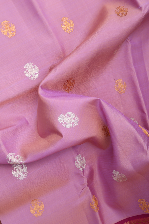 Kanchipuram Silk Saree In Pink With Iruthalai Pakshi Buttas