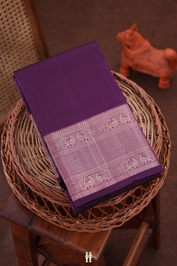 Kanchipuram Silk Saree In Plain Deep Purple With Zari Border