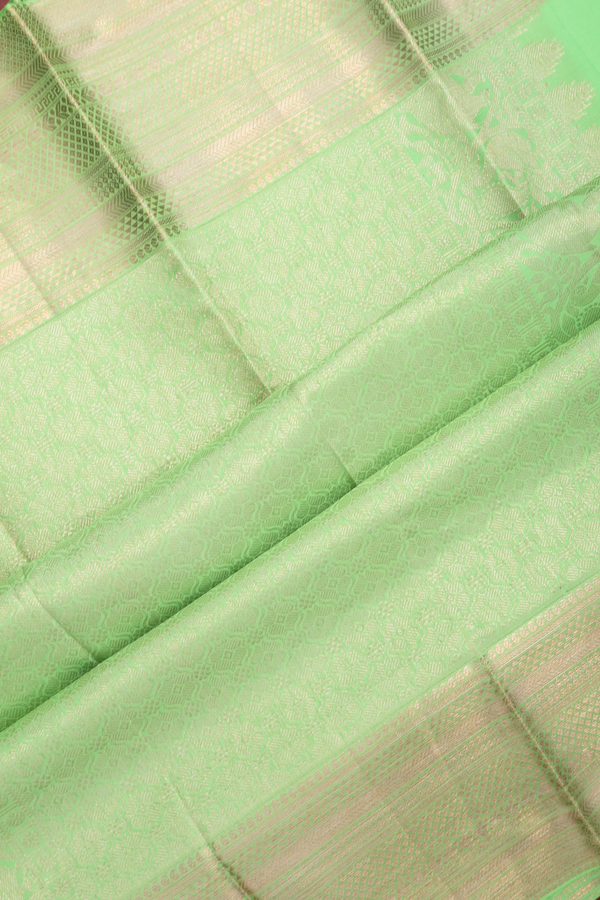 Kanchipuram Silk Saree In Plain Green With Zari Border