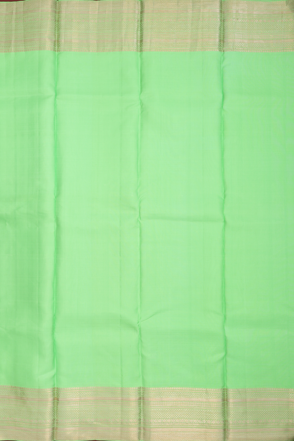 Kanchipuram Silk Saree In Plain Green With Zari Border