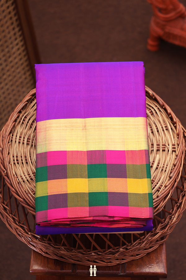 Kanchipuram Silk Saree In Plain Purple With Checks Border