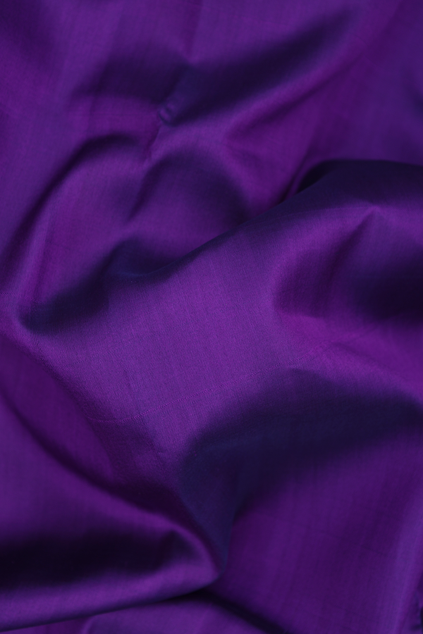 Kanchipuram Silk Saree In Plain Purple With Zari Border