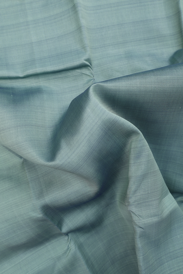 Kanchipuram Silk Saree In Plain Sage Green With Zari Border