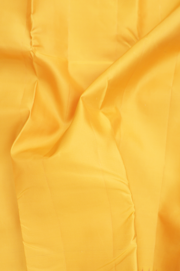 Kanchipuram Silk Saree In Plain Yellow With Contrast Border