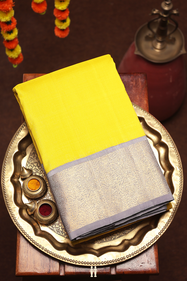 Kanchipuram Silk Saree In Plain Yellow With Korvai Border