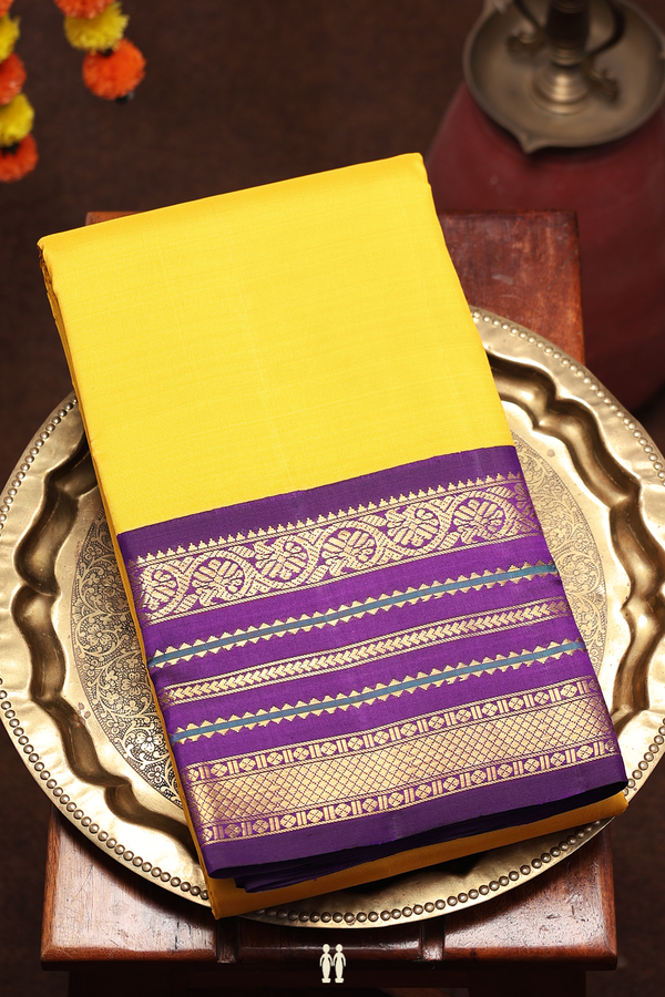 Kanchipuram Silk Saree In Plain Yellow With Korvai Border