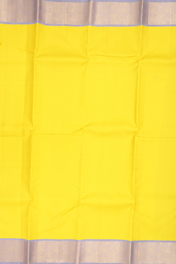 Kanchipuram Silk Saree In Plain Yellow With Korvai Border
