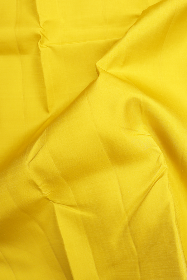 Kanchipuram Silk Saree In Plain Yellow With Korvai Border