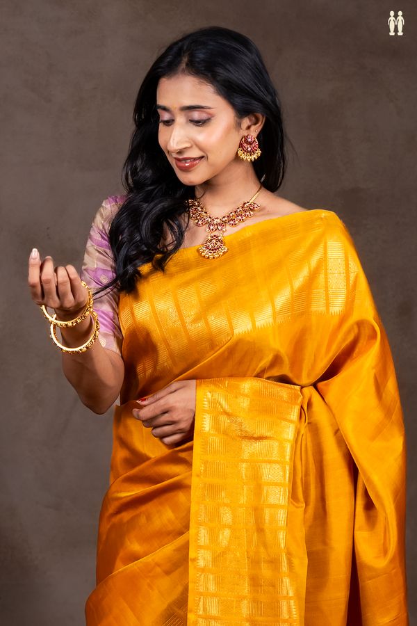 Kanchipuram Silk Saree In Plain Yellow With Zari Border