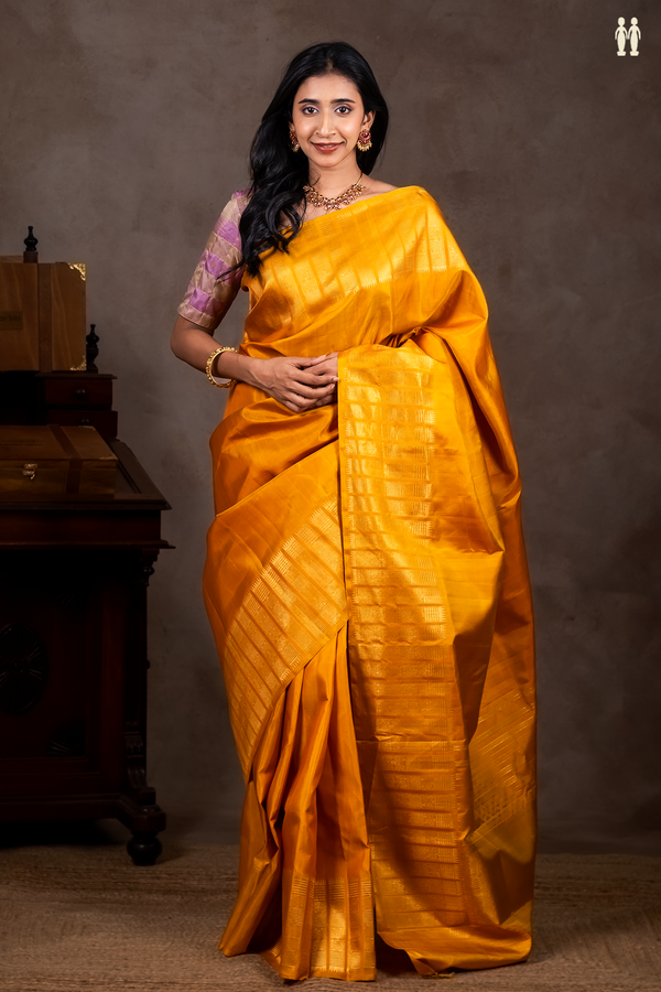 Kanchipuram Silk Saree In Plain Yellow With Zari Border