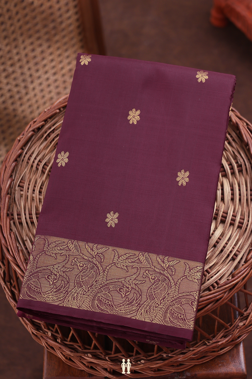 Kanchipuram Silk Saree In Dark Maroon With Floral Buttas