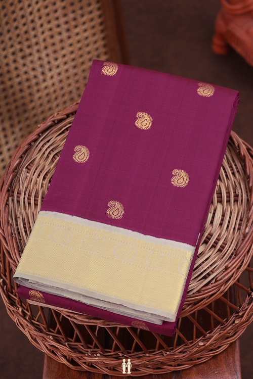 Kanchipuram Silk Saree In Plum Purple With Floral Buttas