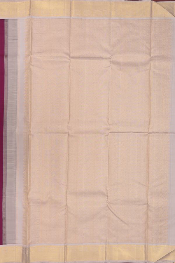 Kanchipuram Silk Saree In Plum Purple With Floral Buttas