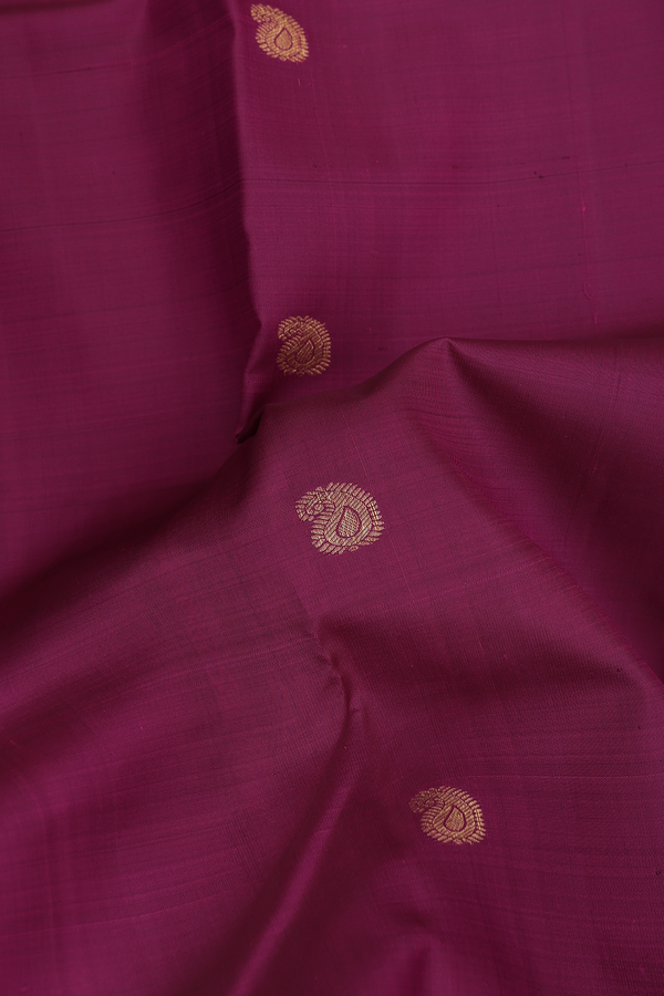 Kanchipuram Silk Saree In Plum Purple With Floral Buttas