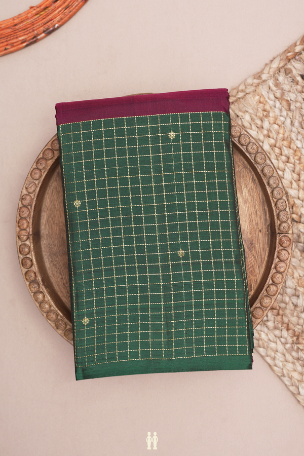 Kanchipuram Silk Saree In Plum Purple With Floral Buttis