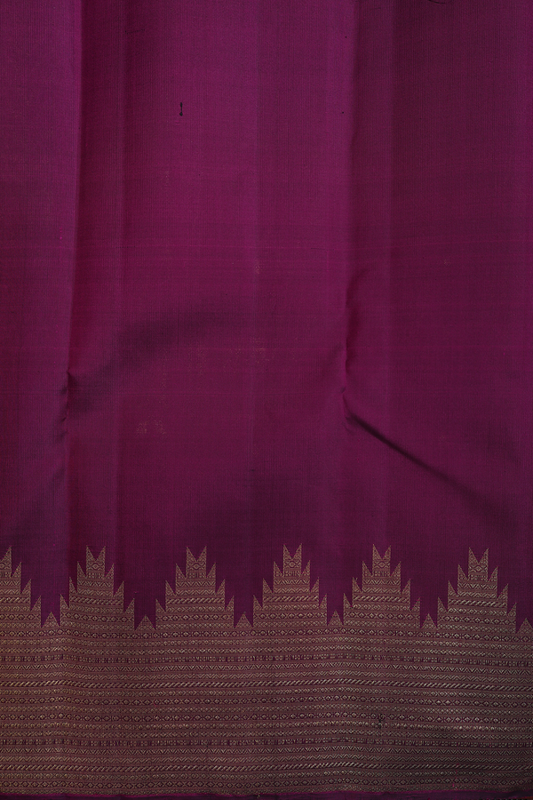 Kanchipuram Silk Saree In Plum Purple With Paisley Buttas