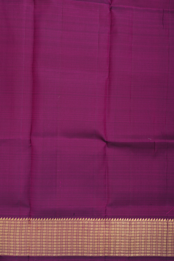 Kanchipuram Silk Saree In Plum Purple With Peacock Buttas