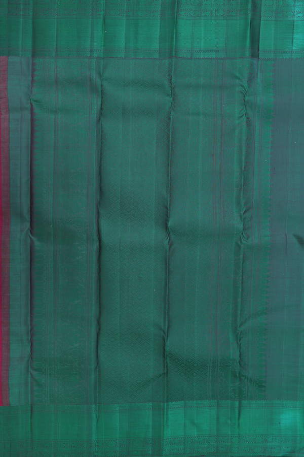Kanchipuram Silk Saree In Plum Red With Peacock Buttas