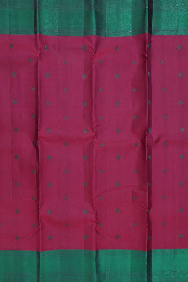 Kanchipuram Silk Saree In Plum Red With Peacock Buttas