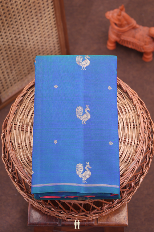 Kanchipuram Silk Saree In Prussian Blue With Peacock Buttas