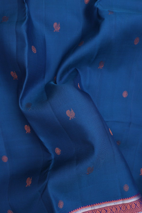 Kanchipuram Silk Saree In Prussian Blue With Peacock Buttas