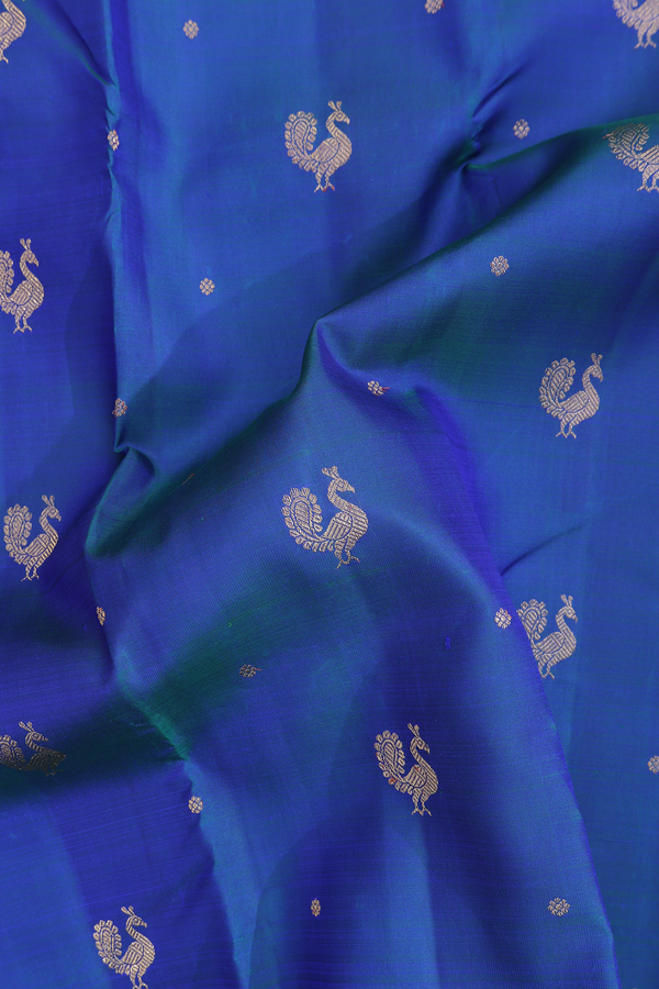 Kanchipuram Silk Saree In Prussian Blue With Peacock Buttas