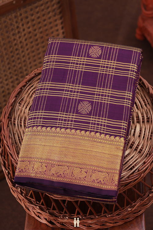 Kanchipuram Silk Saree In Purple Along Checks With Buttas