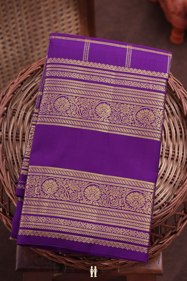 Kanchipuram Silk Saree In Purple Along Checks With Buttas