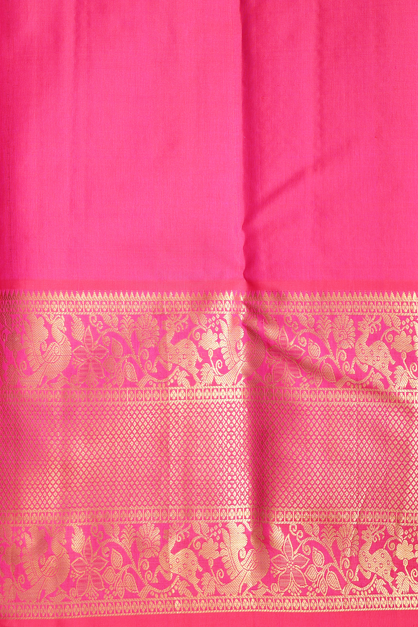 Kanchipuram Silk Saree In Purple Along Checks With Buttas