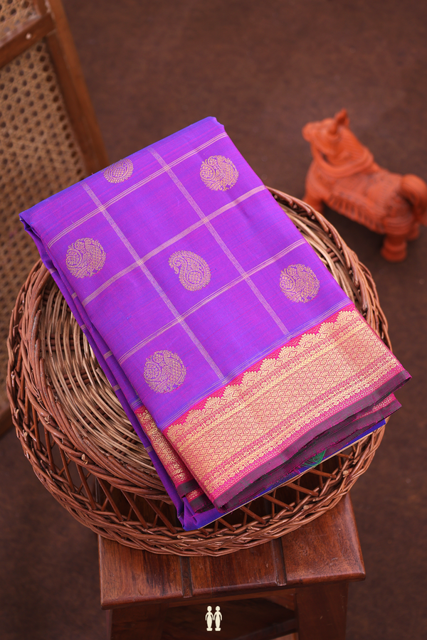 Kanchipuram Silk Saree In Purple Along Checks With Buttas